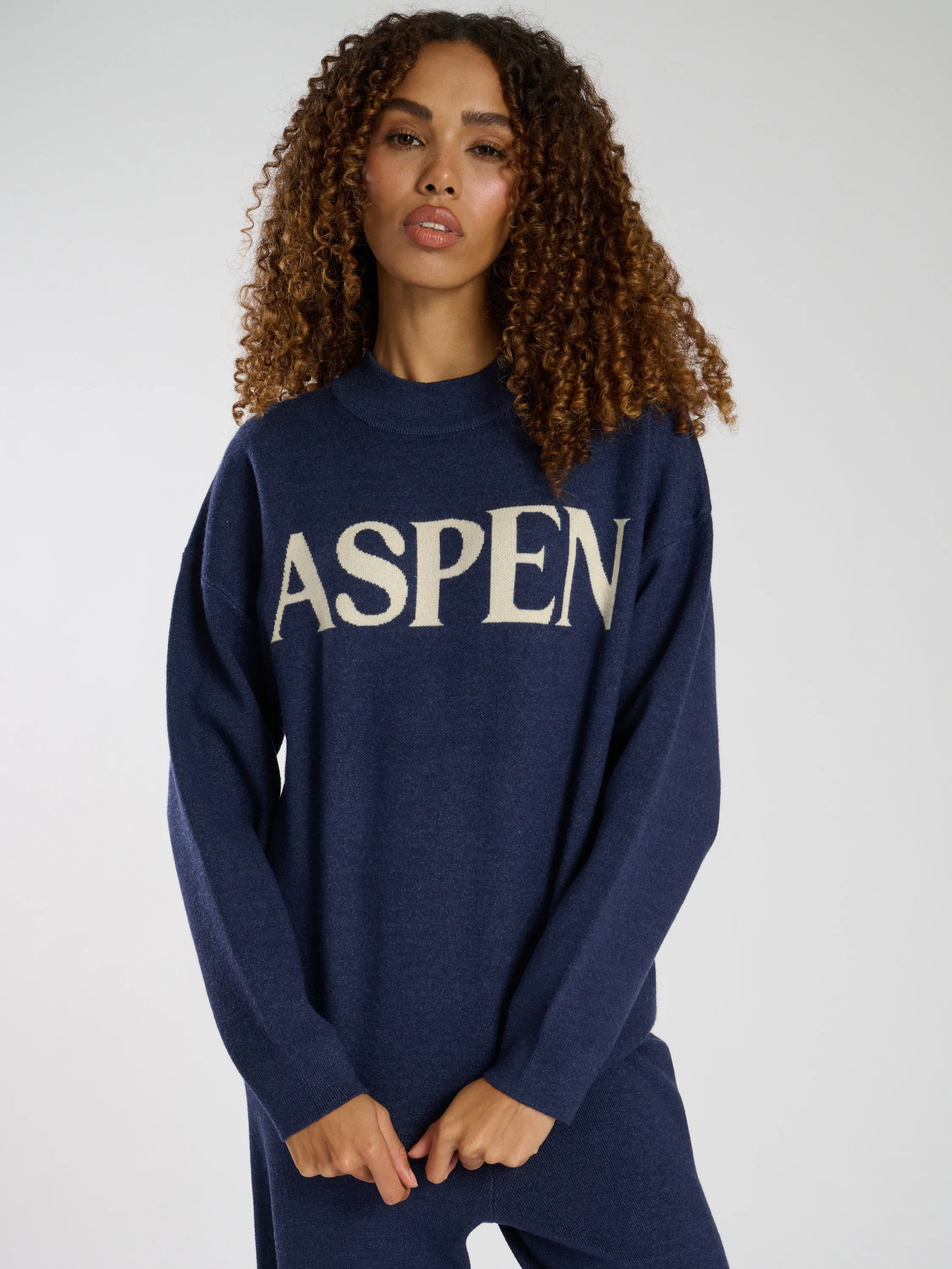 The 'Content' knitted crew neck sweater in Navy