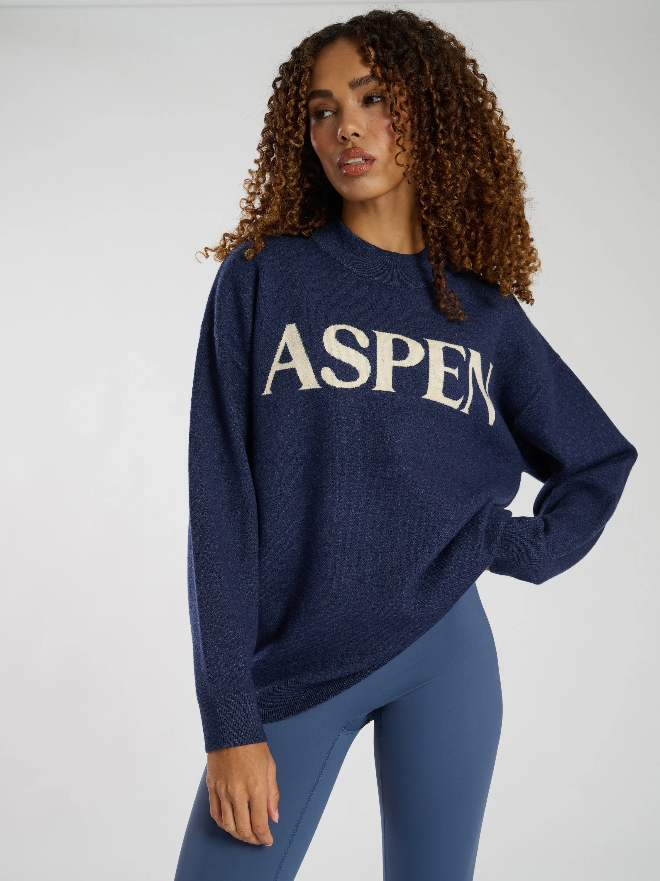 The 'Content' knitted crew neck sweater in Navy
