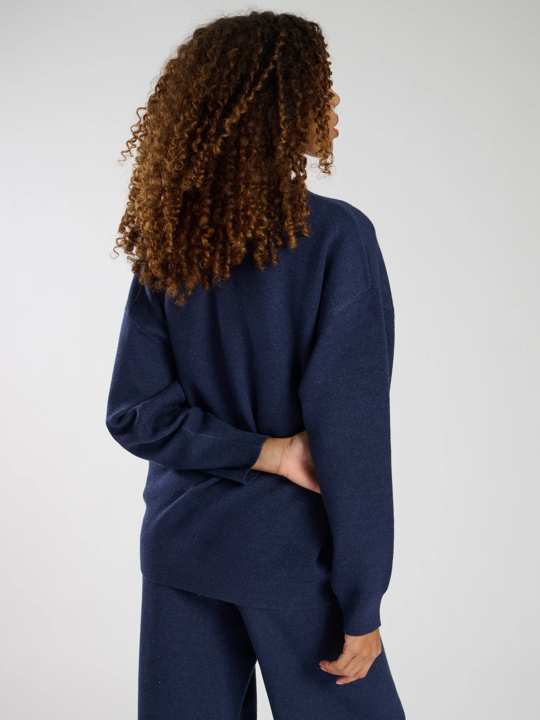 The 'Content' knitted crew neck sweater in Navy